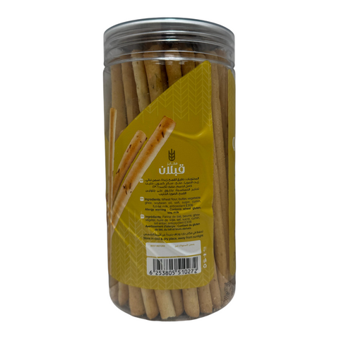 Qabalan Salted Stick Cumin 250 G displayed in a kitchen setting with other spices.