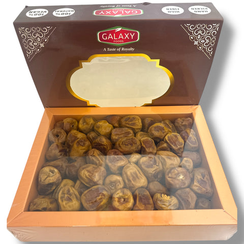 Close-up view of Galaxy sukkari dates showcasing their rich texture, emphasizing organic sukkari dates as a premium, healthy treat.