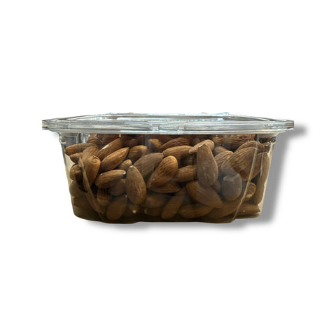 Close-up of Albasha RAW almonds, highlighting the natural texture and flavor of raw almonds for nutrition enthusiasts.