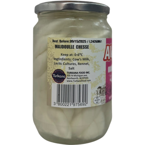 A gourmet platter featuring Aleppo mejdoulle cheese, ideal for entertaining and pairing with wine.