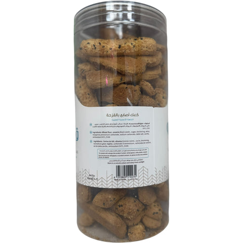 A platter of Qablan fingers cookies with black seeds breadsticks, perfect for snacks or appetizers.