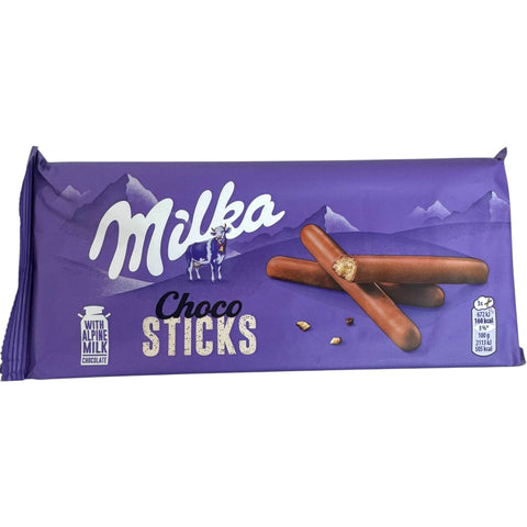 Milka chocolate sticks 112g package showcasing delicious chocolate-covered wafer sticks.