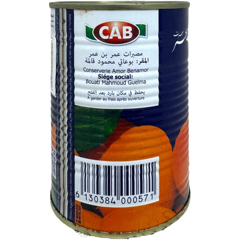 Delicious algerian apricot jam on a spoon, highlighting the thick consistency and natural apricot flavor.