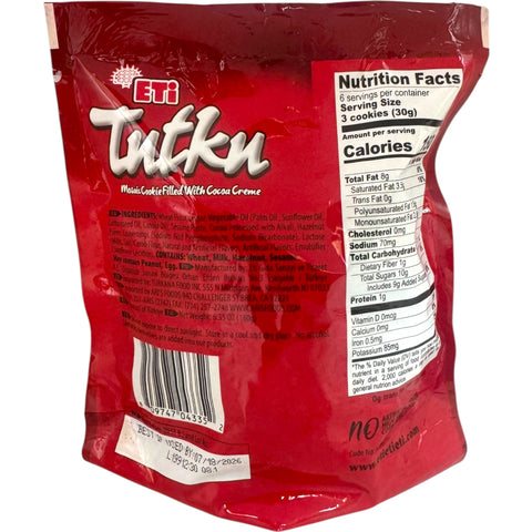 Close-up of Eti tutku cookies filled with Choco cream 180g emphasizing the rich chocolate cream filling.