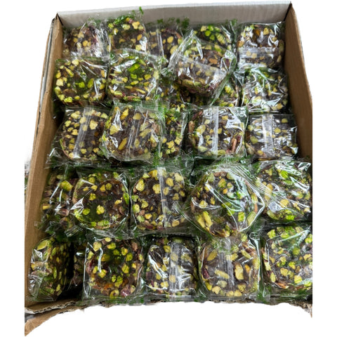 Delicious pieces of Nogat w pistachios 1Lb Turkish delight on a decorative plate, highlighting the essence of turkish delight with pistachios.