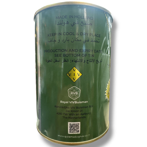 Close-up view of gold medal ghee, emphasizing its rich texture and golden color.
