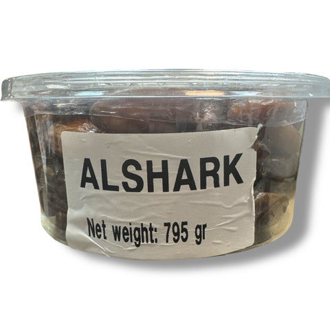 A bowl filled with Al shark deglet noor pitted dates, perfect for healthy snacking and culinary use.