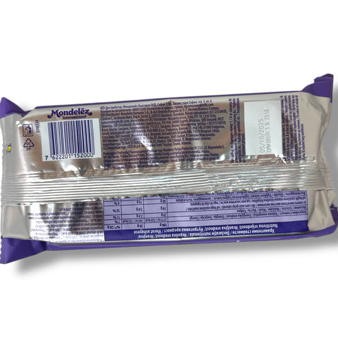Close-up image of Milka Oreo chocolate cookies, highlighting the creamy Oreo filling encased in rich Milka chocolate for a delightful treat.