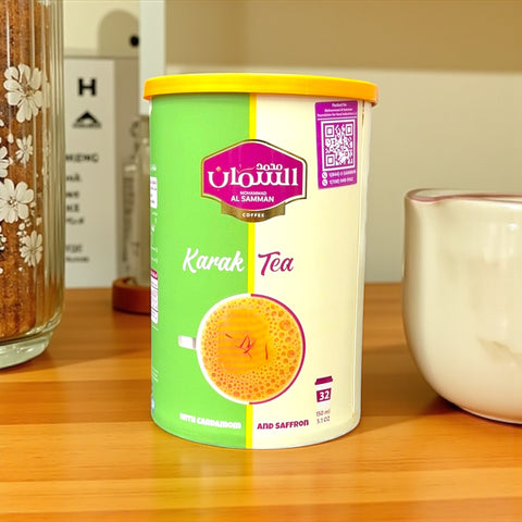 AL SAMMAN Karak Tea with cardamom and saffron packaged beautifully, emphasizing the essence of karak tea with cardamom in every sip.