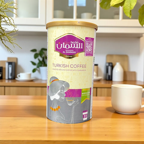 Serving suggestion of TURKISH COFFEE ROASTED GROUND COFFEE WITH CARDAMOM-500g brewed, emphasizing the robust flavor of Turkish coffee ground.