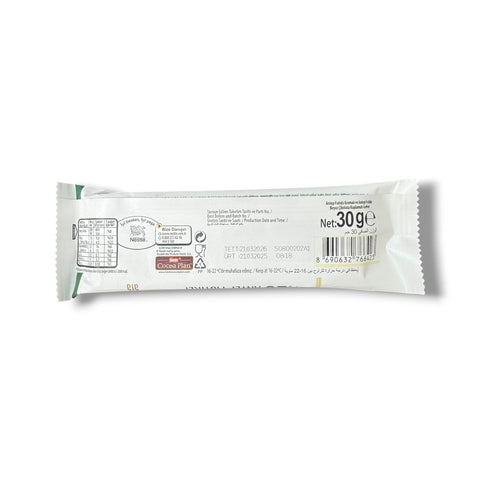 Close-up view of Nestle Damak Ala Pistachio White Chocolate Coated Wafer 30g highlighting the creamy texture of the pistachio chocolate wafer.