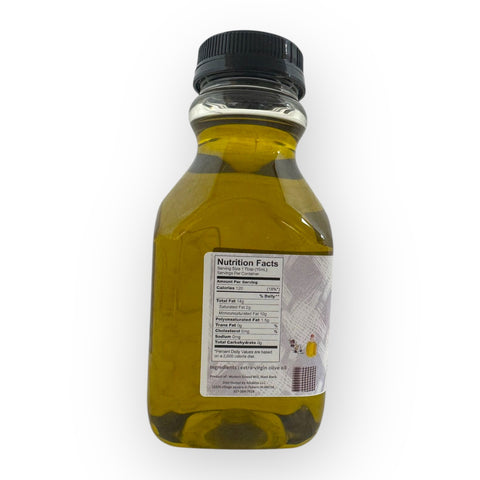 Palestinian Extra Virgin Olive Oil 500ML displayed with fresh ingredients, promoting its premium quality olive oil benefits for cooking.