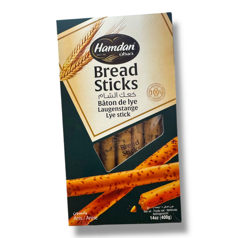 Hamdan breadsticks - Anis packaging featuring crispy flavored breadsticks with a touch of anise, ideal for snacking.