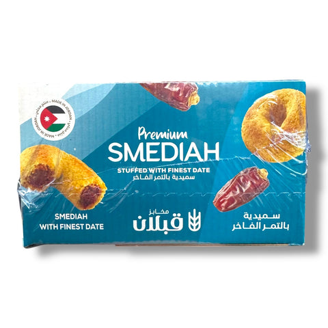 Close-up view of Qabalan Premium SMEDIAH - 12pc packaging. The design showcases delightful images of the sweets, promoting Qabalan as a premier brand for premium middle eastern sweets.