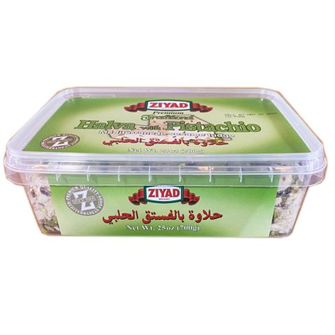 Ziyad Halva with Pistachio presented in a clear container, featuring a green label and markings in both English and Arabic with the product weight of 25.7 ounces.