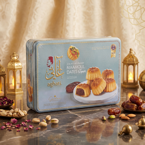 Eid Sweets & Gift Collection featuring an array of traditional Eid desserts including maamoul, baklava, and gourmet cookies, perfect for celebrating the festive occasion.