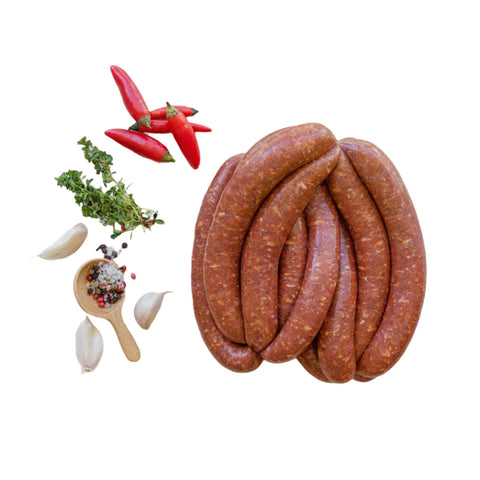 The Butcher Shop offering high-quality halal meat delivery, featuring an assortment of products including premium halal lamb chops, chicken breast, and handmade sausages.