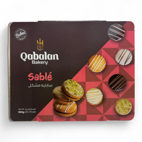 Qablan Petitfor Sable Assorted 900 G packaged cookies showcasing an assortment of flavors and textures.