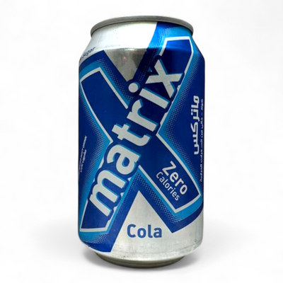 Matrix Cola Zero Calories Carbonated Drink 330ml in a sleek can design, showcasing the refreshing beverage with zero calories.