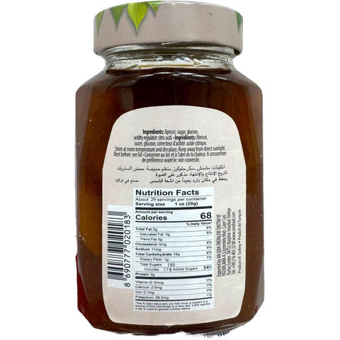 Sera apricot jam elegantly displayed on a rustic wooden table, showcasing its rich flavor and versatility.