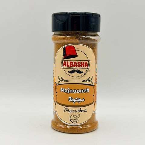 Majnooneh Mix – Authentic 24-Spice Blend showcasing the exquisite array of spices. This authentic spice blend consists of 24 natural ingredients including turmeric and cumin, perfect for enhancing traditional Middle Eastern dishes.