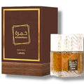 Gourmet Khamrah Coffee in elegant brown and gold packaging with clear glass bottle showcasing rich aromatic brew