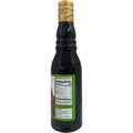 Sadaf pomegranate molasses 300ml alongside fresh pomegranates, emphasizing its natural ingredients and flavor profile.