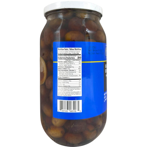 Cortas black olives displayed in a jar, showcasing whole black olives ideal for Mediterranean dishes and appetizers.
