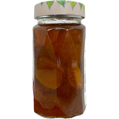 Close-up view of Sera apricot jam, highlighting the fresh apricot pieces, ideal for enhancing breakfast.