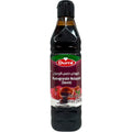 Durra pomegranate molasses bottle showcasing the rich, dark color and texture of the product.