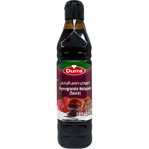 Durra pomegranate molasses bottle showcasing the rich, dark color and texture of the product.