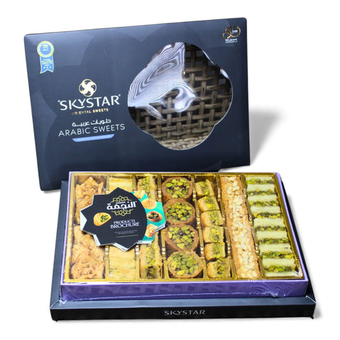 Al Nejmah Sweets assorted baklava package highlighting the rich textures and flavors of the various baklava pieces in Super size (500g).
