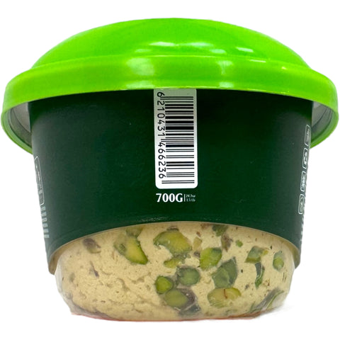 Serving suggestion of Four season halva with pistachios 700g - Halva with pistachios served on a plate, ideal for sharing.