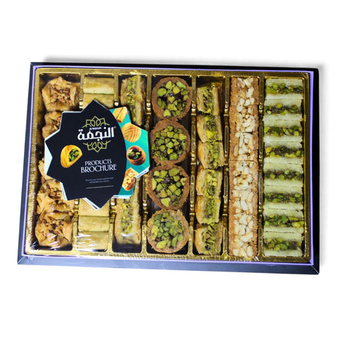 Al Nejmah Sweets assorted baklava package containing a variety mix, Super size (500g) showcased in an elegant presentation.