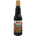 Sadaf pomegranate molasses 300ml bottle displayed on a white background, showcasing its rich color and packaging.