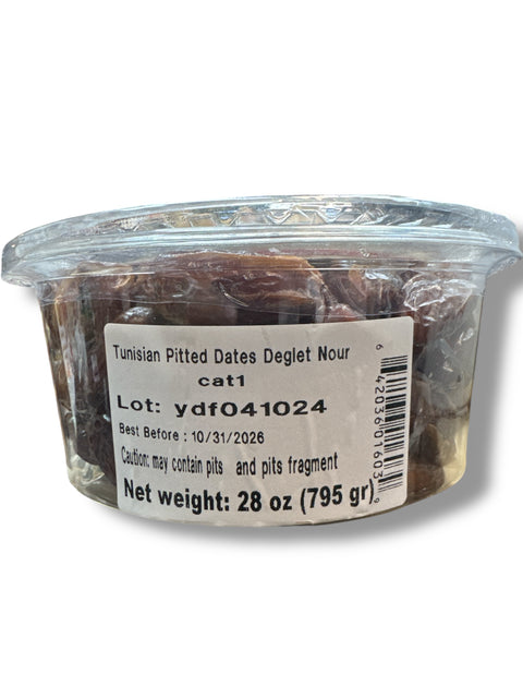 Close-up view of Al shark deglet noor pitted date highlighting its rich texture and natural sweetness.