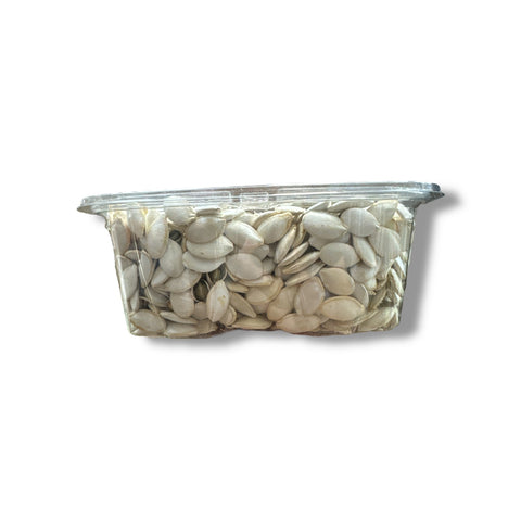Close-up of Albasha Unsalted Pumpkin Seeds revealing their crunchy texture and natural flavor; a nutritious and heart-healthy choice for snacking, baking, or adding to dishes featuring unsalted pumpkin seeds.