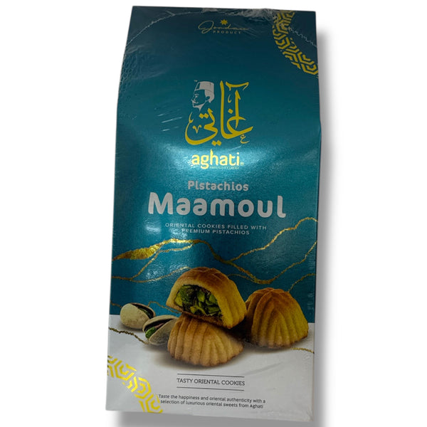Aghati Pistachio Maamoul cookies packaging with traditional Middle Eastern pistachio-filled cookies on a blue background