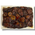 Close-up image of Zeina sukkari dates, showcasing their rich color and texture. Shop for sukkari dates online to enjoy their natural sweetness.
