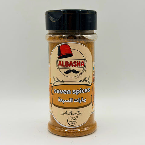 ALBASHA Seven Spice Seasoning Blend in a beautifully arranged container, showcasing the vibrant colors of the seven spice seasoning that enhances meats, vegetables, and rice dishes.