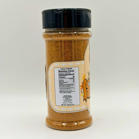 Close-up of ALBASHA Seven Spice Seasoning Blend, highlighting the rich and aromatic texture of this versatile seasoning perfect for grilling and roasting.