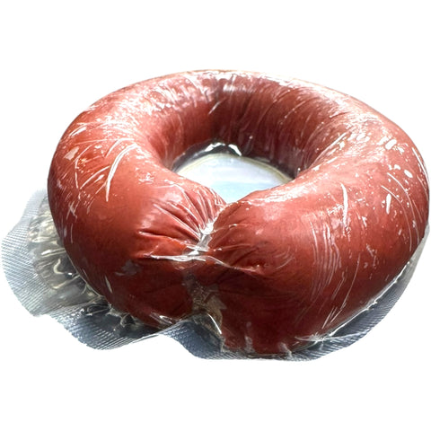 Sliced Nema hot sucuk 1lb served on a plate, perfect for appetizers and party platters.