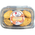 Albasha Barazek cookies displayed in a clear plastic container, showcasing the sesame-covered treats.