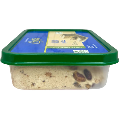 Close-up of Cortas halva with pistachios, showcasing its rich texture and nutty flavor.