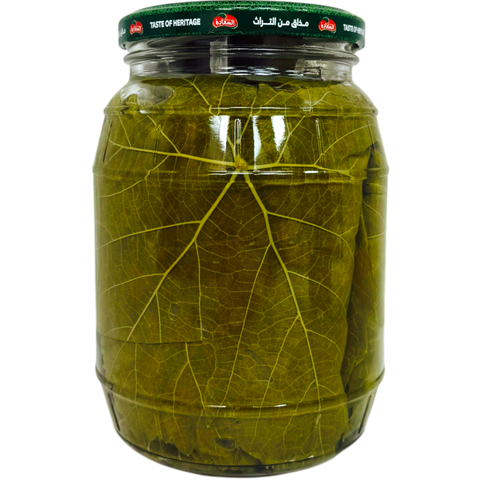 A jar of Alsaadah grape leaves for cooking, highlighting the product's premium quality and suitability.