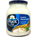 Puck creamy cheese 910g product image featuring creamy cheese spread, ideal for sandwiches and appetizers.
