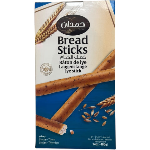 Close-up of Hamdan bread sticks with thyme, showcasing their crispy texture and flavorful infusion of thyme. Enjoy these thyme bread sticks!