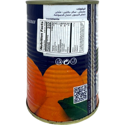 Freshly opened jar of algerian apricot jam with a spreader, perfect for breakfast or baking.
