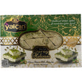 Yalcin Turkish halva with pistachio, a sweet and nutty confection rich in flavor, showcasing its vibrant green pistachios.