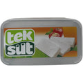 Tek Sut sheep milk cheese 1kg displayed in a rustic setting, highlighting its artisanal characteristics and delicious taste.